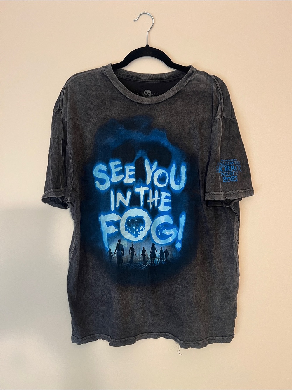 Universal  Black Tee with Bright Blue 'See You In The Fog!' Graphic